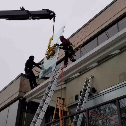 window repair. awning glass repair with crane and rope access.